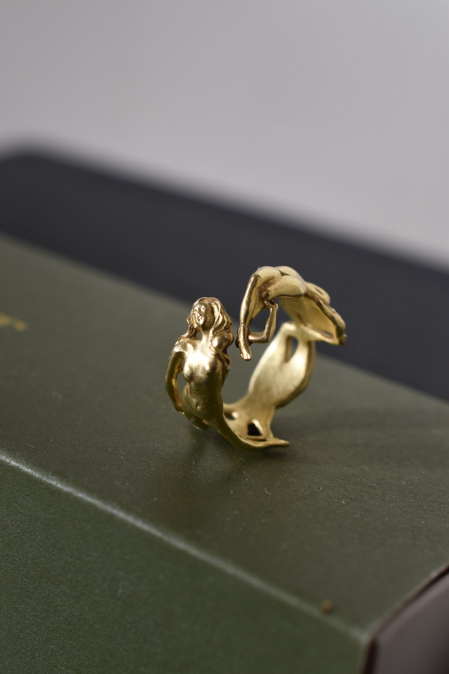 Sculptural Ring with Three Intertwined Female Figures in 18k Yellow Gold