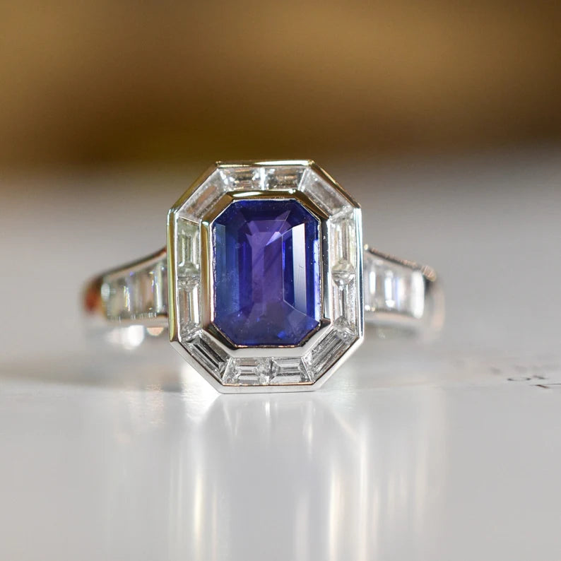 Estate Sapphire and Baguette-cut Diamond Platinum Engagement Ring