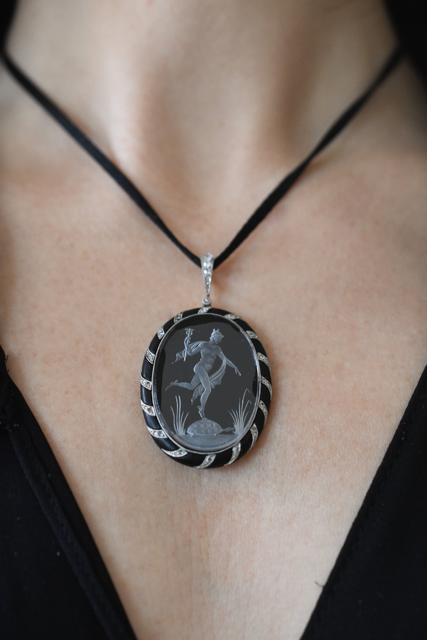 Antique Reverse Intaglio Rock Crystal, Jet and Diamond Pendant depicting Hermes and Chelone