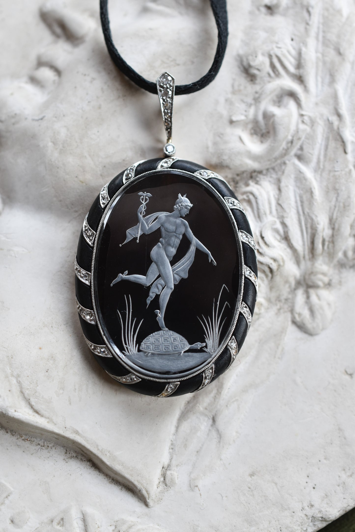 Antique Reverse Intaglio Rock Crystal, Jet and Diamond Pendant depicting Hermes and Chelone