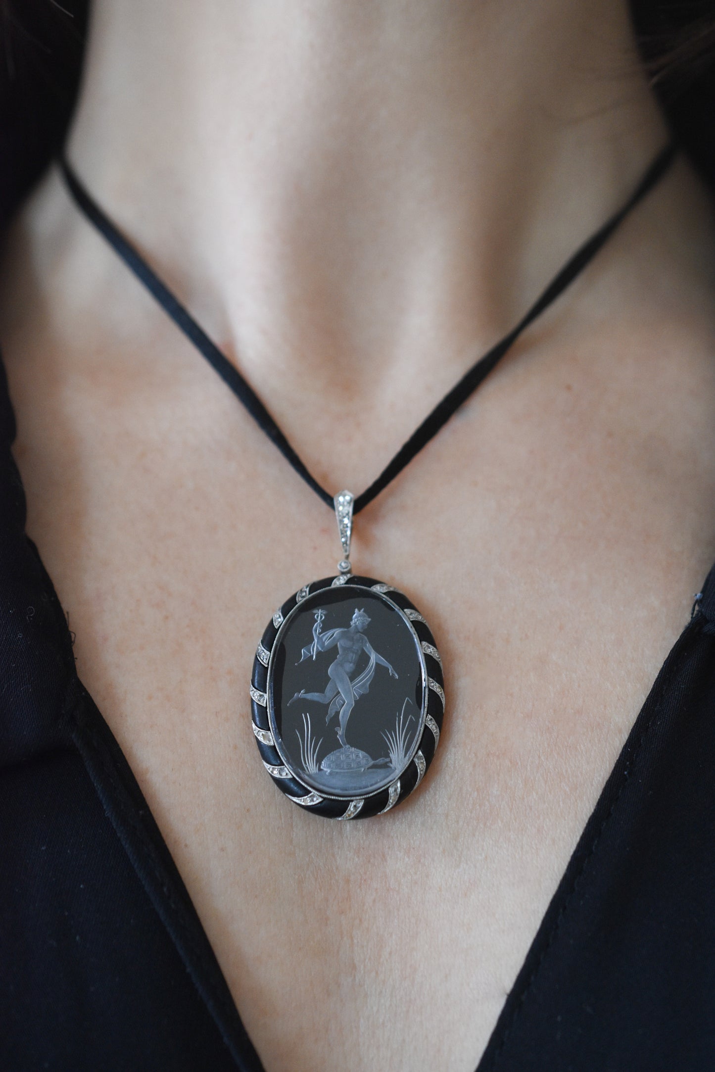 Antique Reverse Intaglio Rock Crystal, Jet and Diamond Pendant depicting Hermes and Chelone