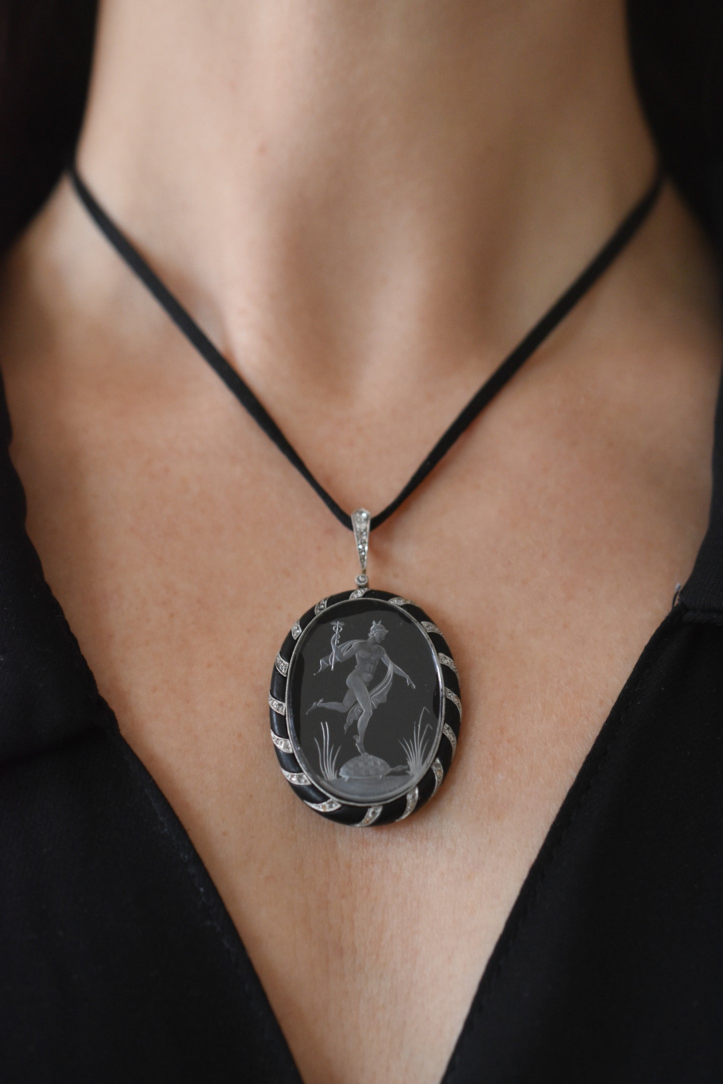 Antique Reverse Intaglio Rock Crystal, Jet and Diamond Pendant depicting Hermes and Chelone