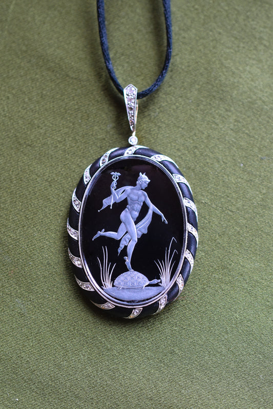 Antique Reverse Intaglio Rock Crystal, Jet and Diamond Pendant depicting Hermes and Chelone