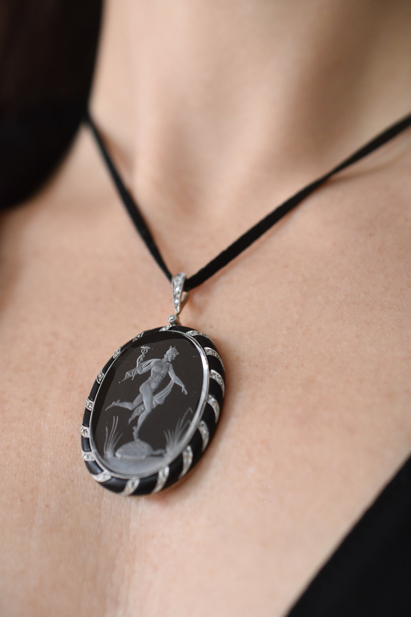 Antique Reverse Intaglio Rock Crystal, Jet and Diamond Pendant depicting Hermes and Chelone