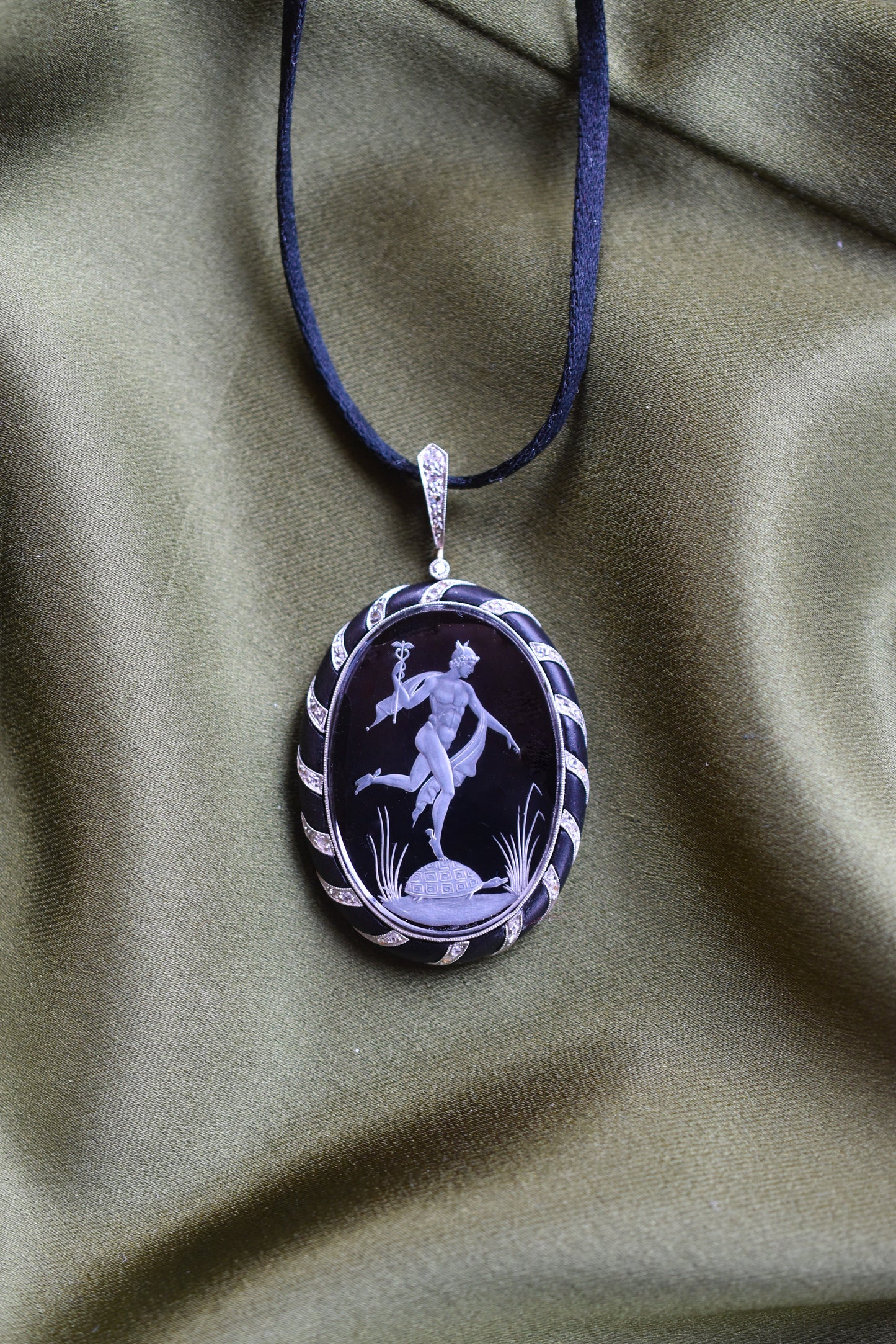 Antique Reverse Intaglio Rock Crystal, Jet and Diamond Pendant depicting Hermes and Chelone