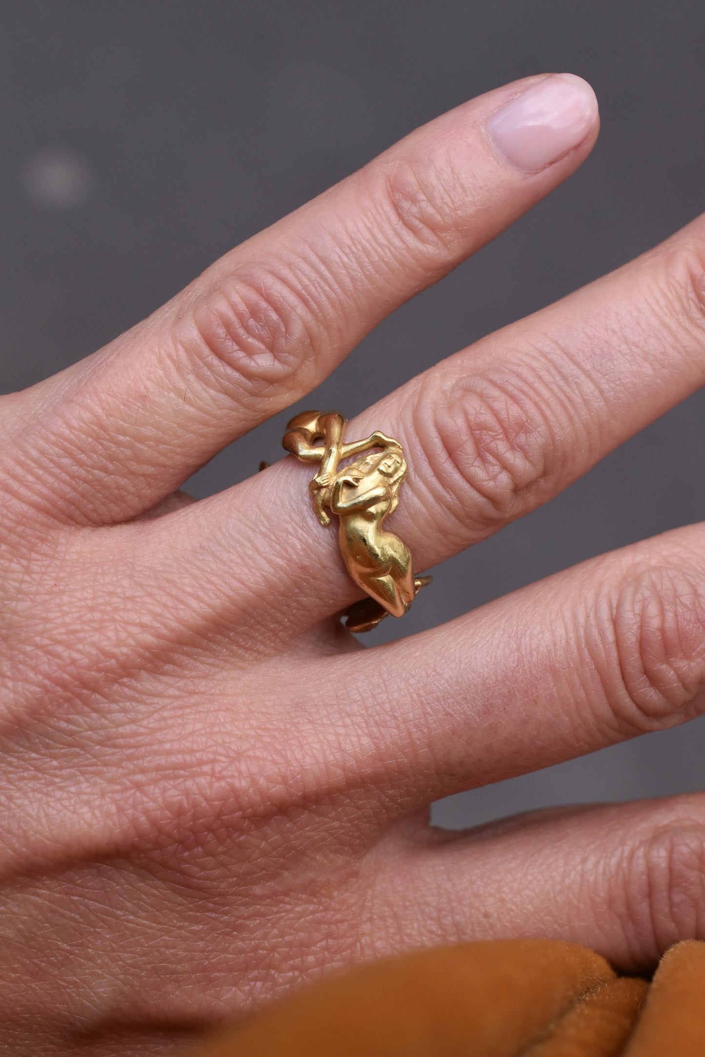Sculptural Ring with Three Intertwined Female Figures in 18k Yellow Gold