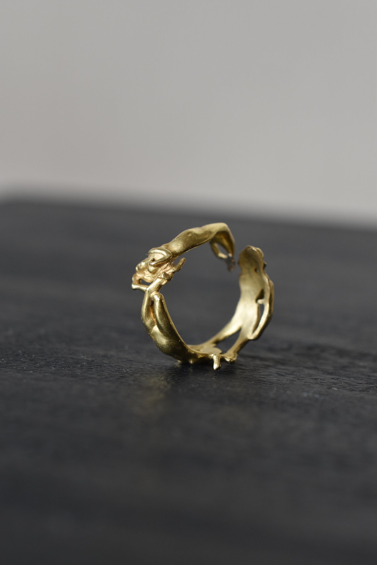 Sculptural Ring with Three Intertwined Female Figures in 18k Yellow Gold