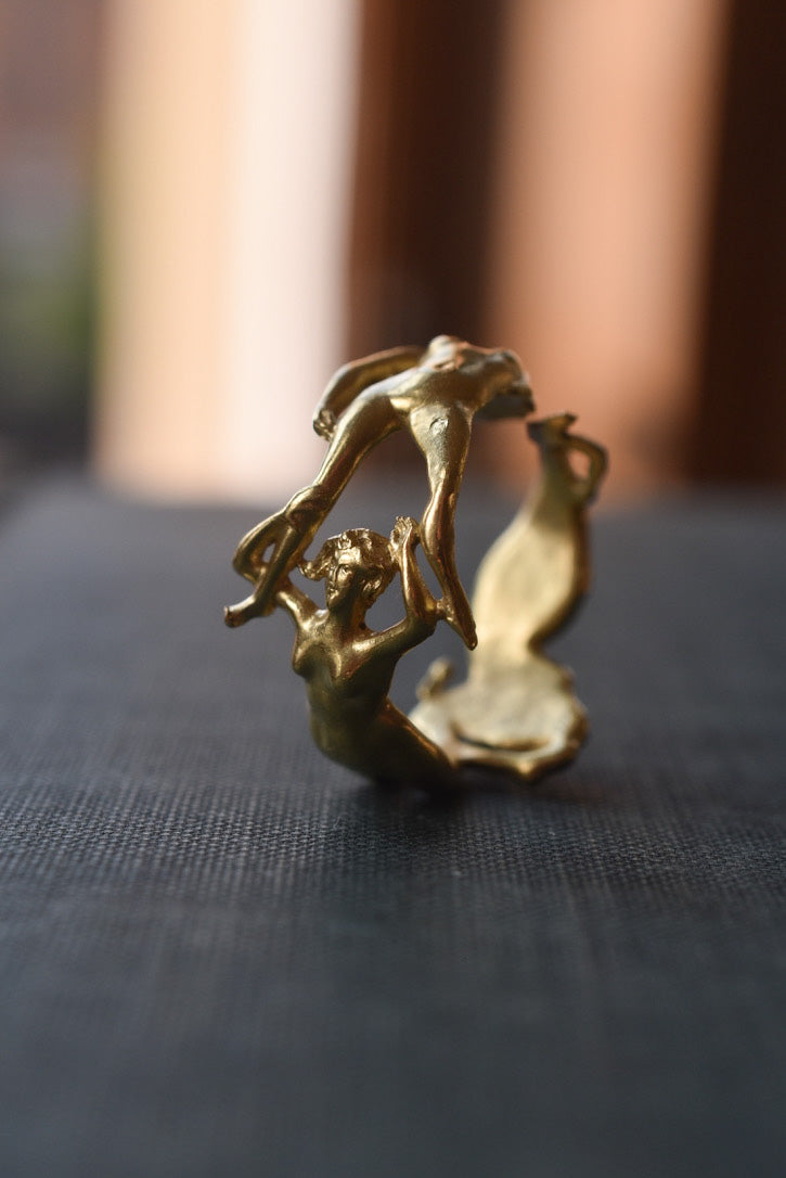 Sculptural Ring with Three Intertwined Female Figures in 18k Yellow Gold