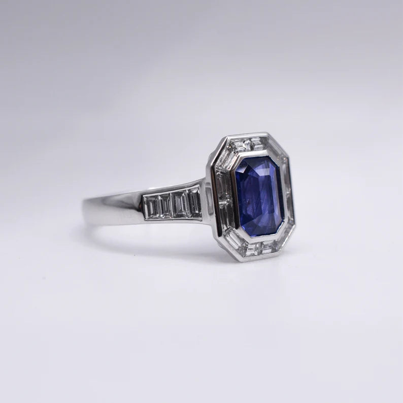 Estate Sapphire and Baguette-cut Diamond Platinum Engagement Ring